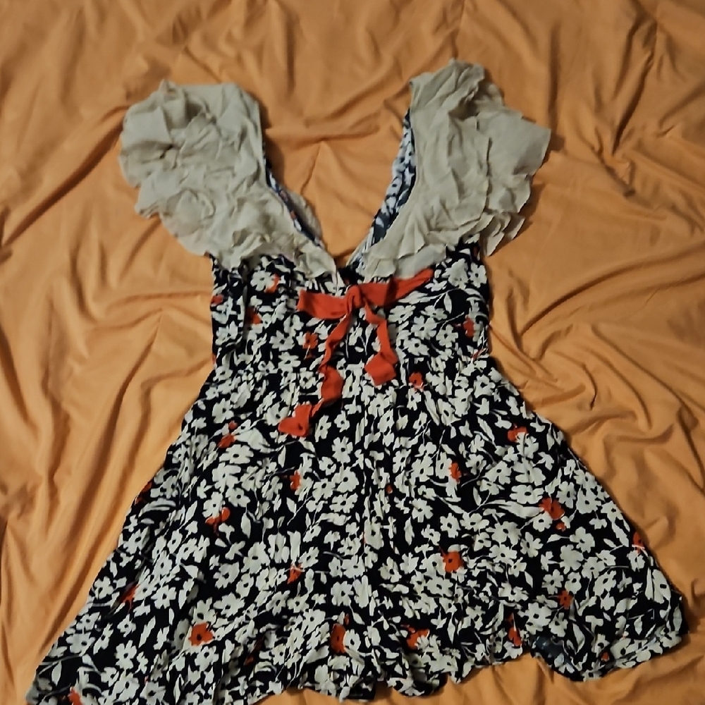 Trashy Diva Black and White Floral Romper with Red Bow